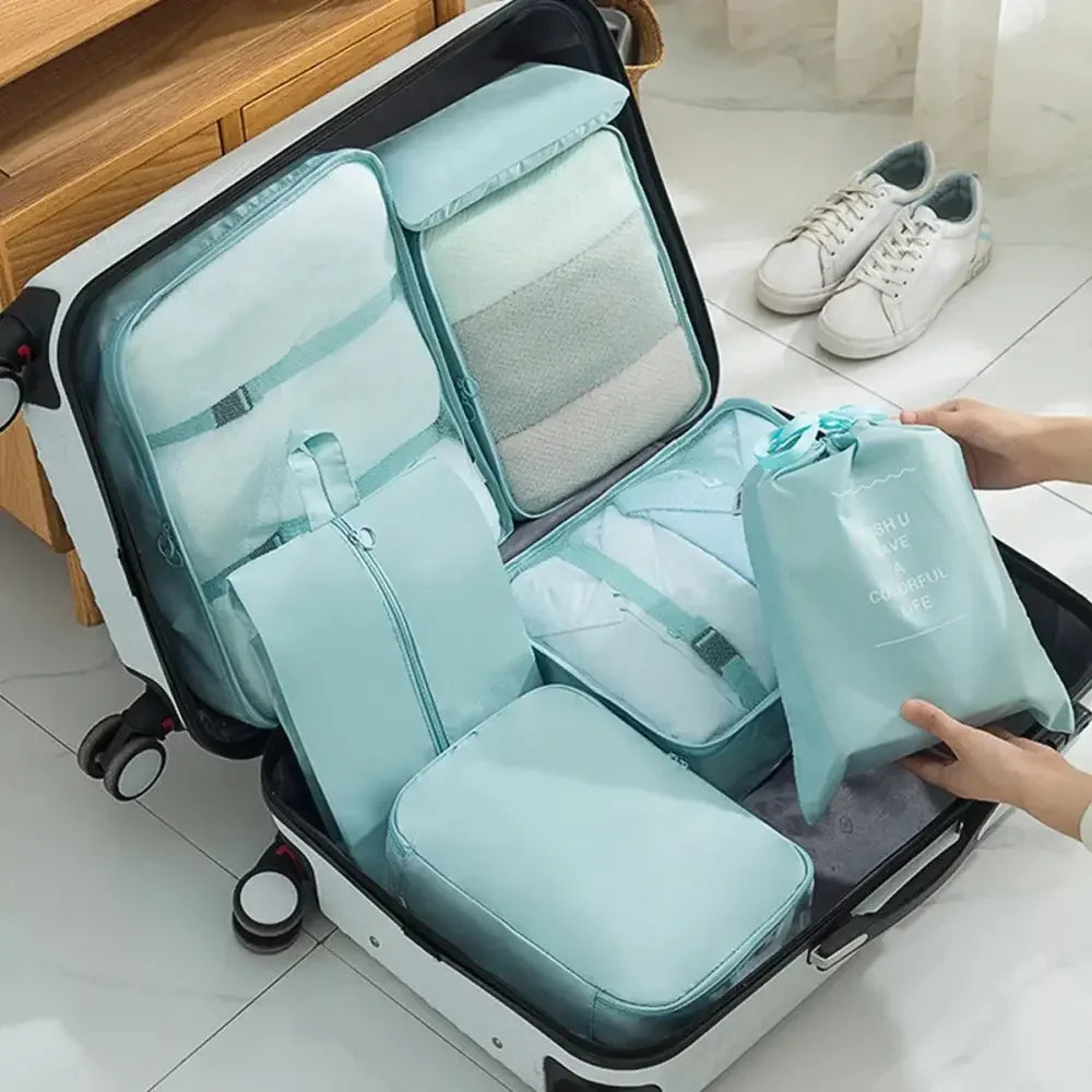 Light blue travel organizer storage in a 7 pcs suitcase packing cubes set for efficient packing