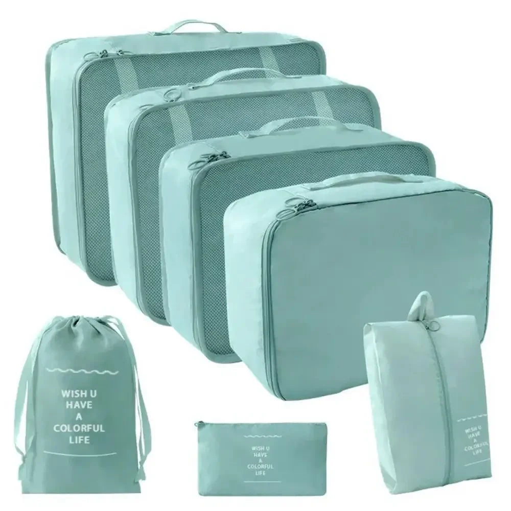 Mint-colored travel organizer storage set with suitcase packing cubes for efficient packing