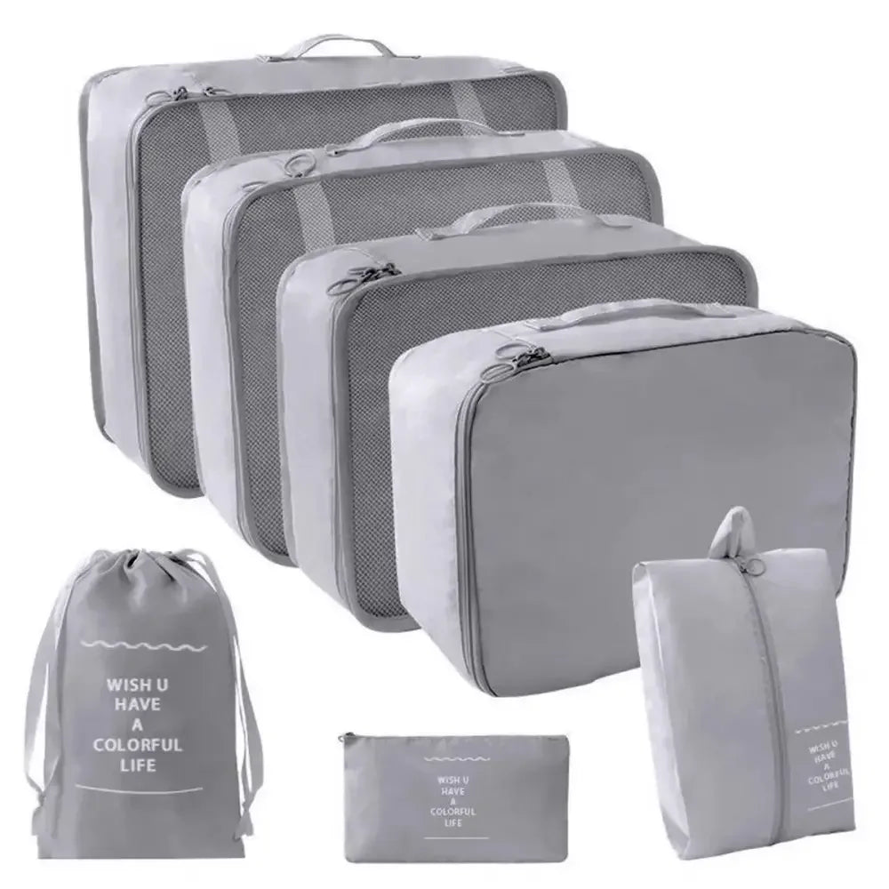 Gray travel organizer storage set with suitcase packing cubes and portable luggage cases