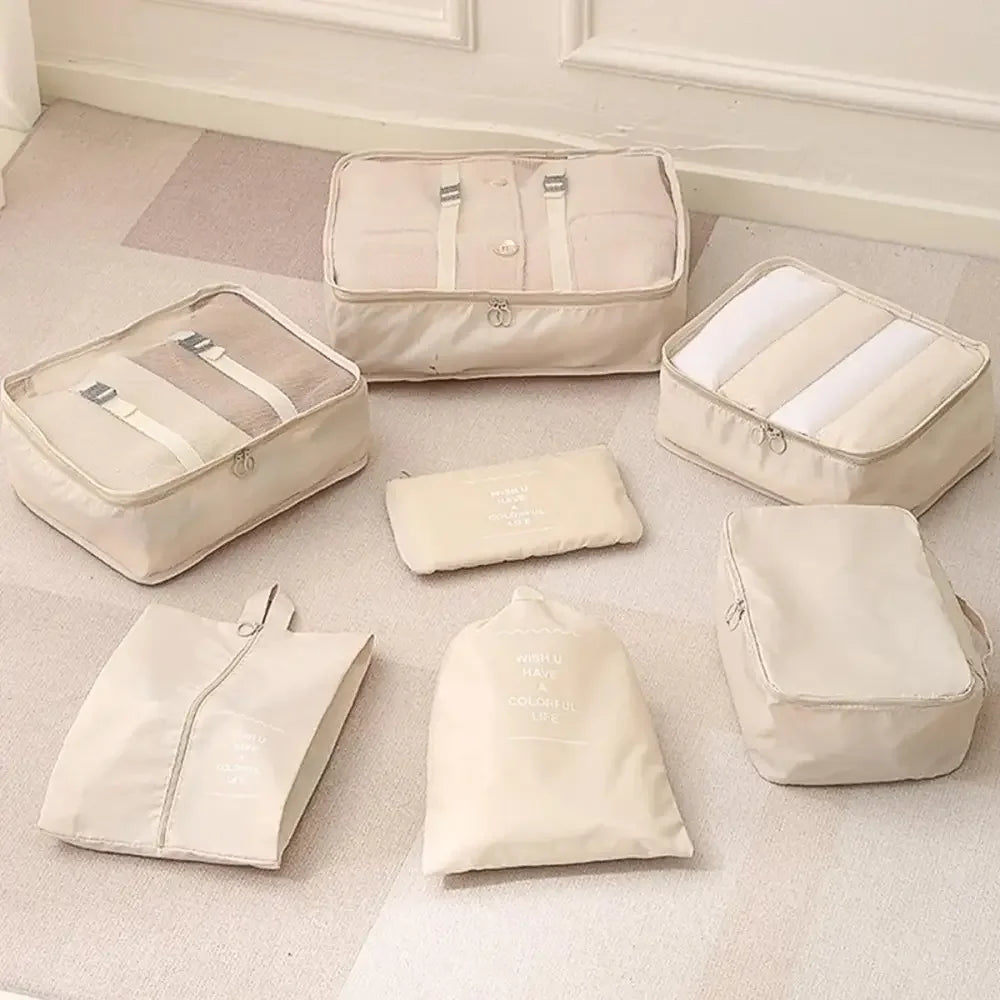 Beige travel organizer storage and suitcase packing cubes set for efficient packing