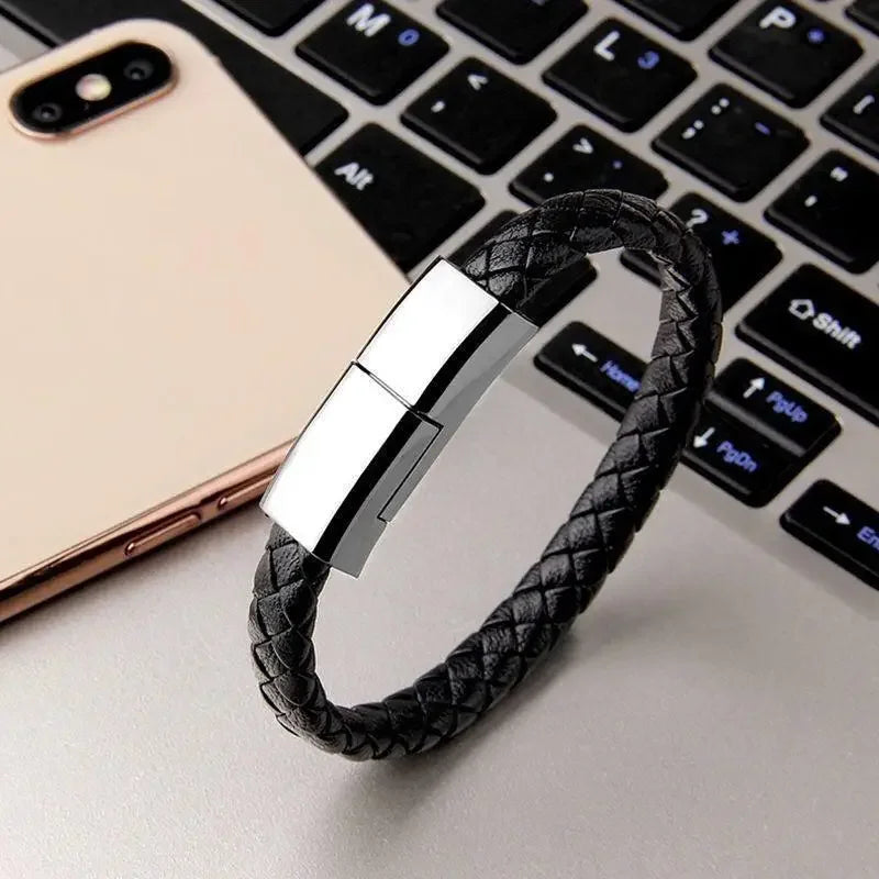 Stylish braided leather bracelet with built-in USB charger for phones and silver clasp